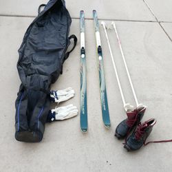 Skis - Boots - Poles - Gloves - Bag