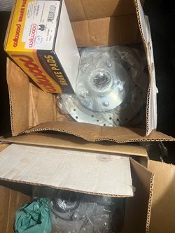 2 new rotors and brake pads