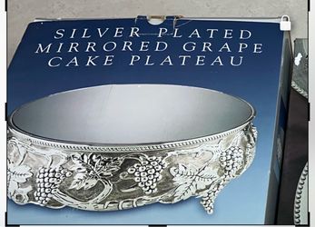 Godinger silver-plated mirrored plateau stand in the Grape pattern.