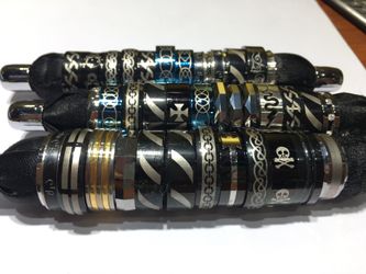 Titanium & Stainless Rings Unisex with variety of Sizes These are brand new. Never been worn or used.
