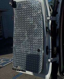Custom-cut diamond plated doors
