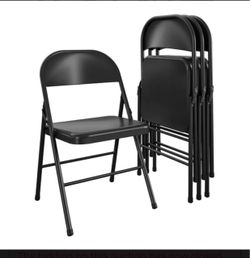 New 4 black folding chairs