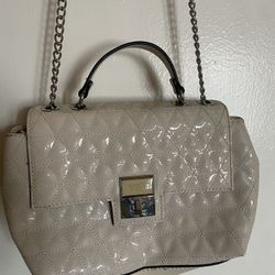 cream colored guess purse 