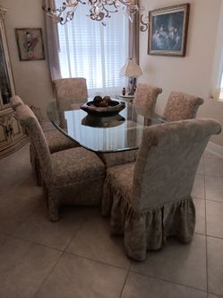 glass table and chairs,