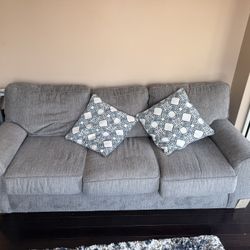 Gray/Silver Couch With 2 Couch Pillows