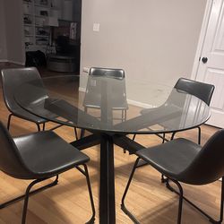 Round glass table w/ 5 Chairs