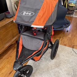 BoB Baby Jogging Stroller Black And orange for Sale in Houston
