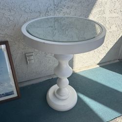 White nightstand with mirror on top