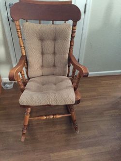 Sold wood rocking chair