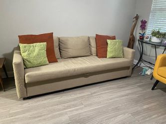 Sofa couch that becomes bed for two with storage