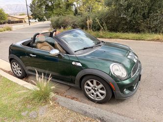 2013 Mini Cooper Roadster convertible-6 speed manual transmission-still runs needs work- as is