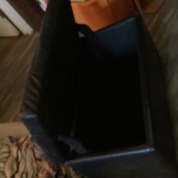 Black storage with vinyl seat