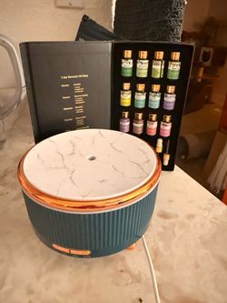 Diffuser with essential oils