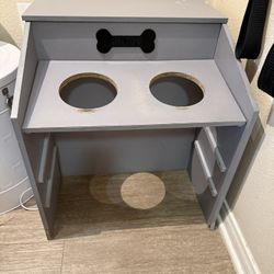 Two pet feeding station storage cabinet