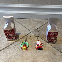 2 Merry Christmas doll pendant. Open box