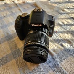 Canon T1i,  With Extra Batteries And Charger, Extra Lens, And Case