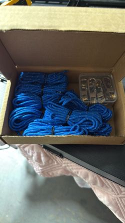Rope with roller tensioner