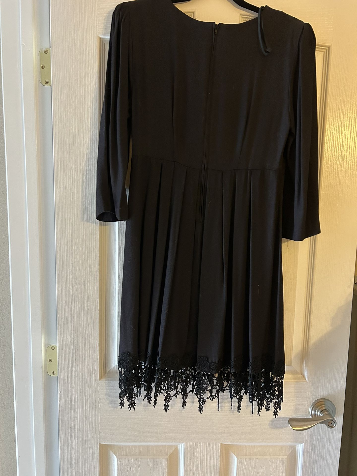 Lovely little black dress size 10 with lace bottom