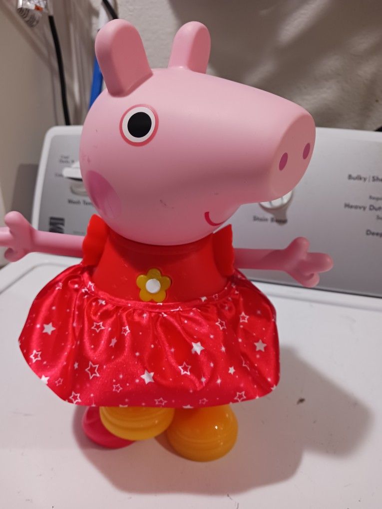 Peppa Pig toys.  Peppa's  Muddy puddles Party doll musical toy for girls and boys.   Good Condition.  interactive. 