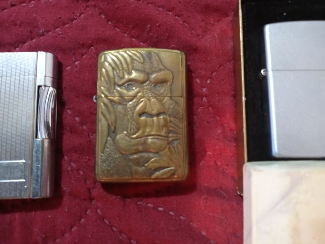 Zippo lighters and tack pins