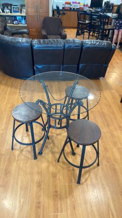 Table with beveled and 3 stools that adjust height