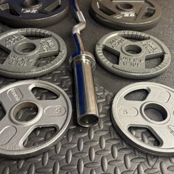 NEW Olympic Equipment Curl Bar of 20# with Cooper Bearings and Plates 2X35s, 2X25s, 2X10s and 2X5s pounds. Brute 170#