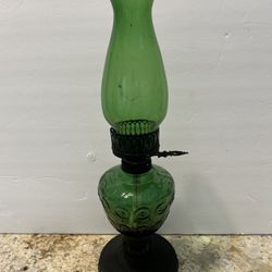 Antique green oil lamp