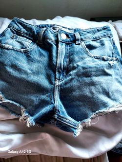 Ladies cutoff shorts by Garage