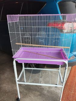Bird cage and stand. Price for both . Like new . No longer need