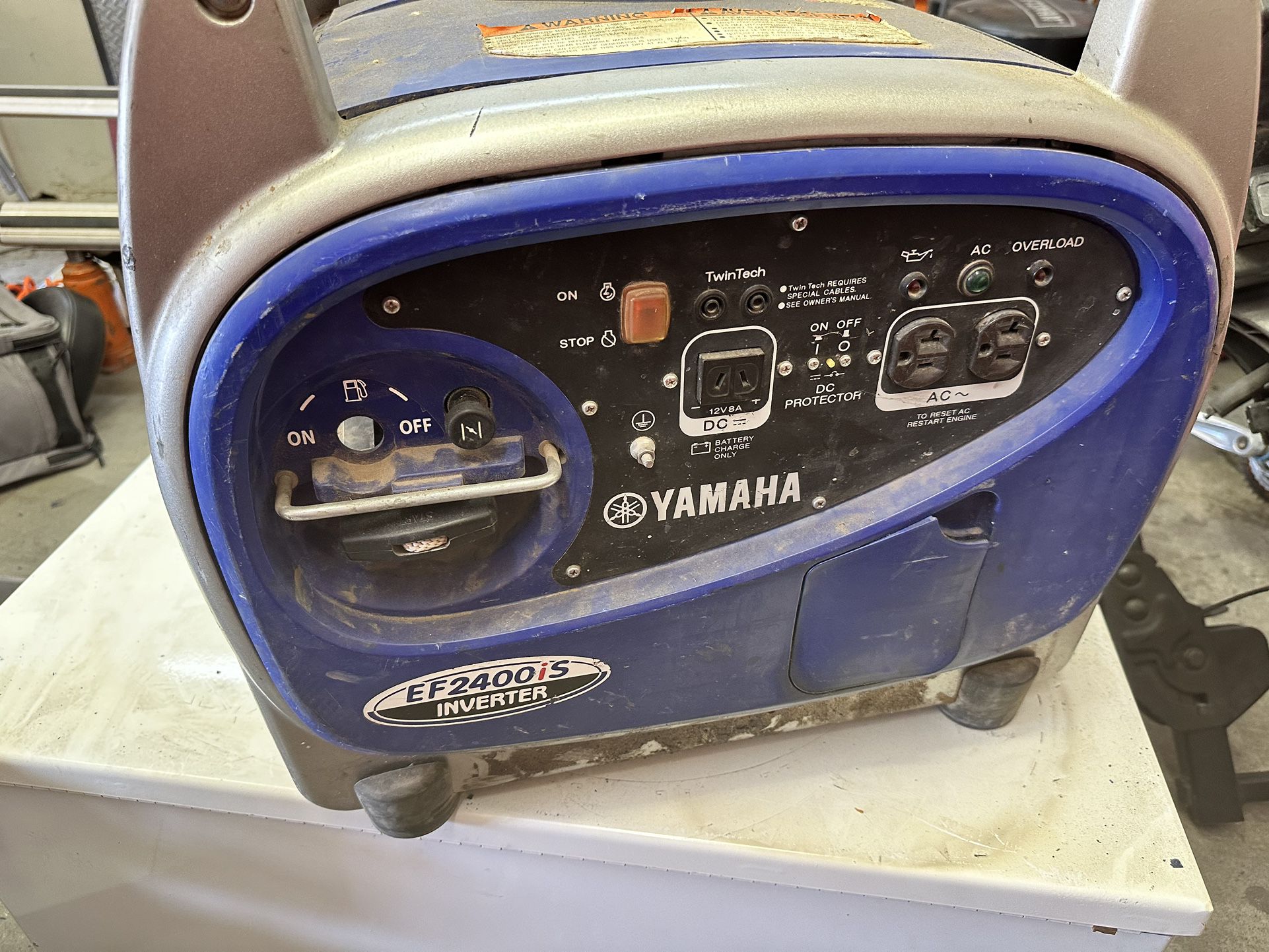 yamaha ef2400 is generator ,needs carb cleaned and missing side cover not running 
