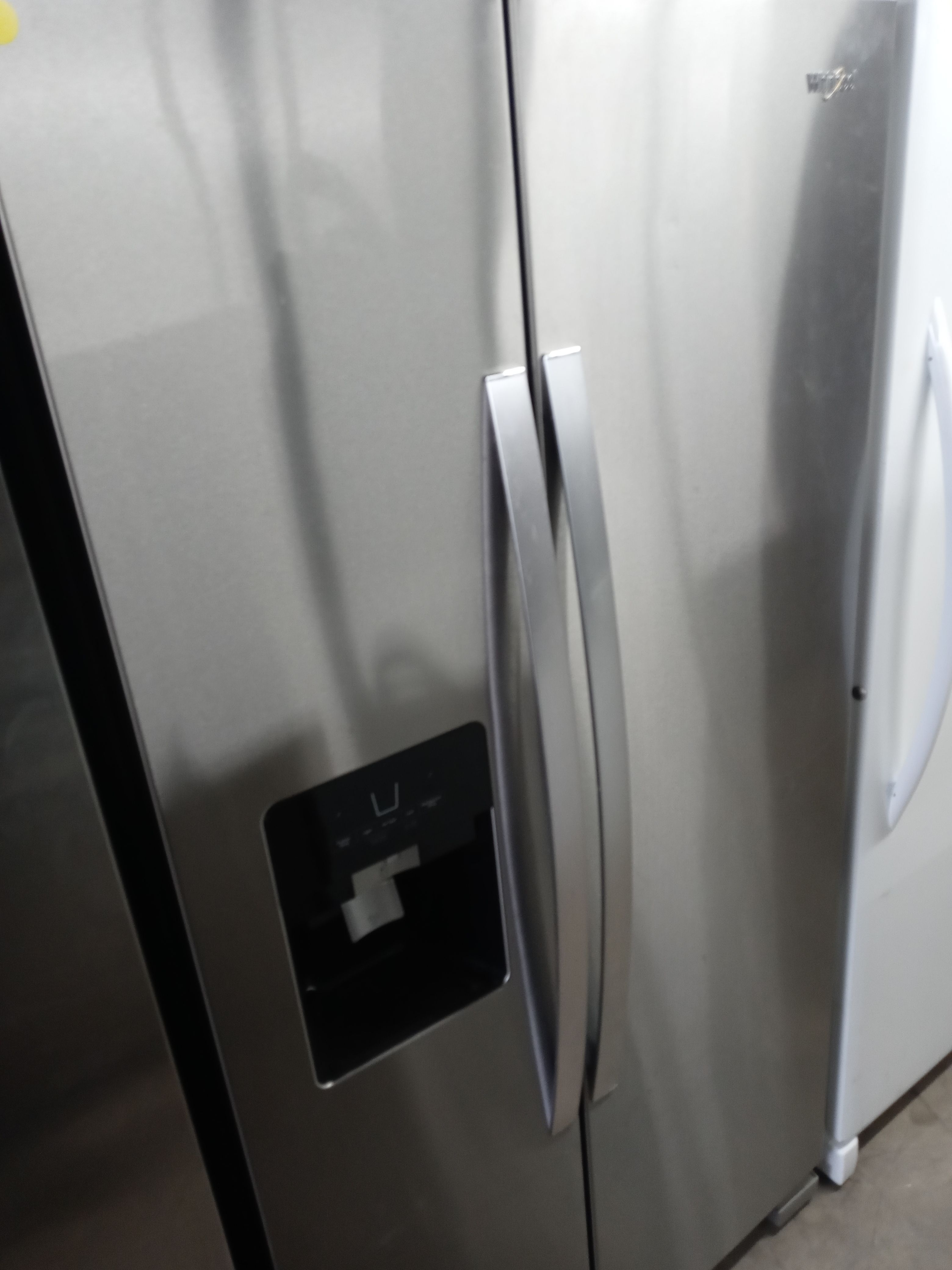Whirlpool stainless steel side by side refrigerator (no door shelves) - Free delivery
