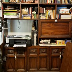 Antique book shelf with 6 cubby holes, one thin storage area,one  large area   and  bottom  storage area doors and  drop down desk)