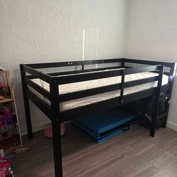 Twin raised bed with mattress