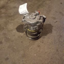 Air compressor for a car