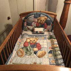 Crib with mattress and bedding
