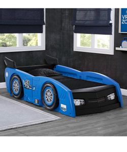 Delta Children Grand Prix Toddler-Twin Conversion bed bright blue - gently used with sheets/blanket