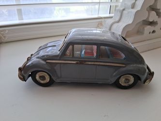 Rare VTG  Japan T.N Nomura, VW BLUE Beetle Tin Friction Toy CAR Collectible....asking $40.00