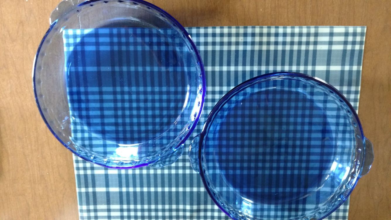 Two Vintage Pyrex cobalt blue deep dish pie plates number 229