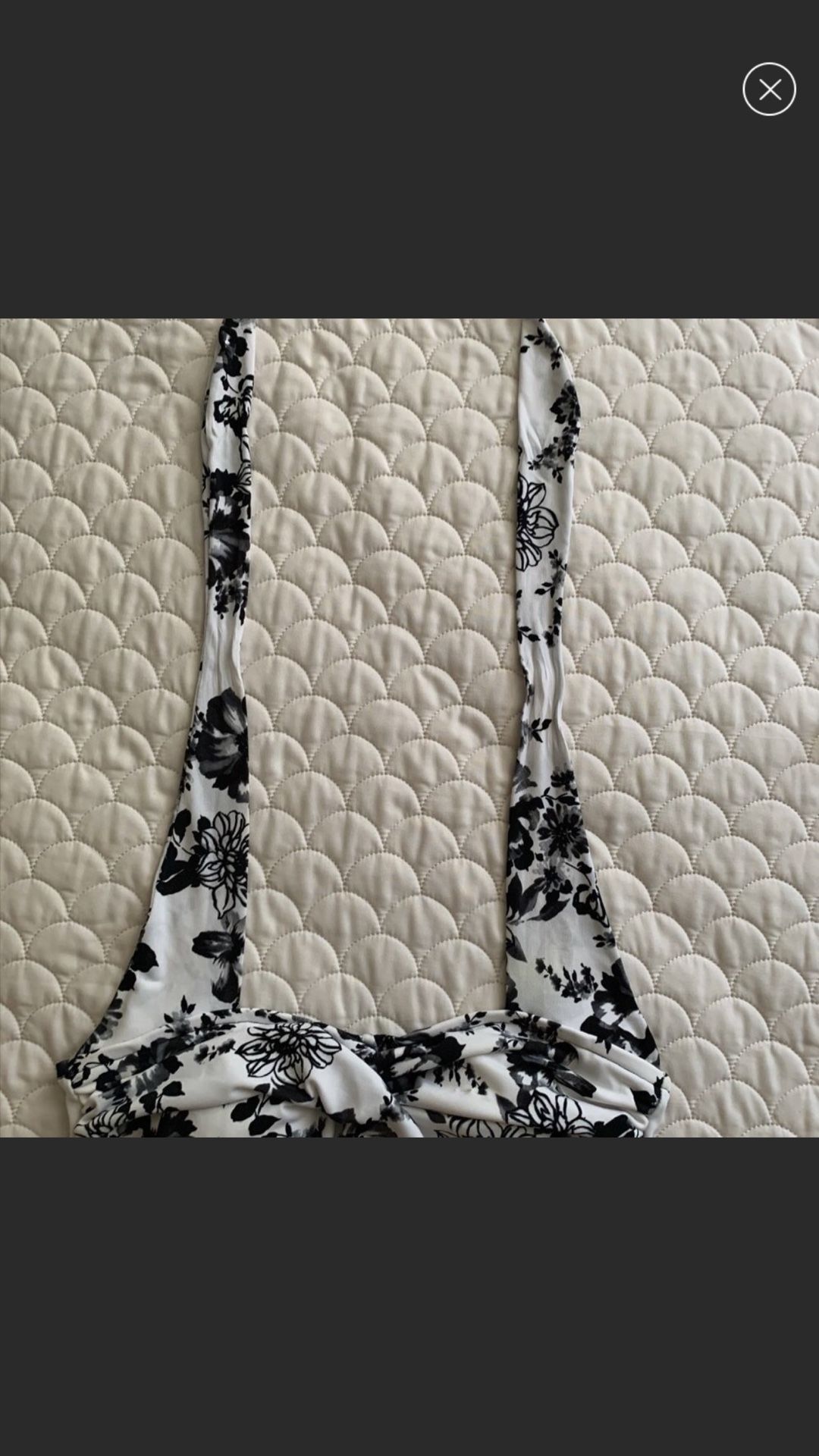 Two piece suit flowery white with black flowers very flattering by Catalina namebrand suddenly slim size medium New Like Condition