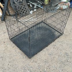 Extra large dog crate 42 inches long by 30 inches high and 27 inches wide
