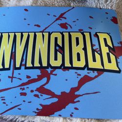 Invincible Graphic Mat with Yellow Logo and Red Splatter