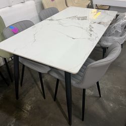 Brand new 5 pcs of set, Sintered Stone Dining Table: 63 Inch Grey Kitchen Table with Metal Legs ,with 4 chairs  $330  Warehouse Address: 2745 Boone st