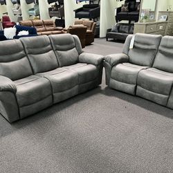 New Reclining Couch / Love Seat.  Grey Breathable Leatherette.  Free Delivery!