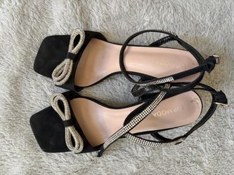 Black heels, silver bow , size 11