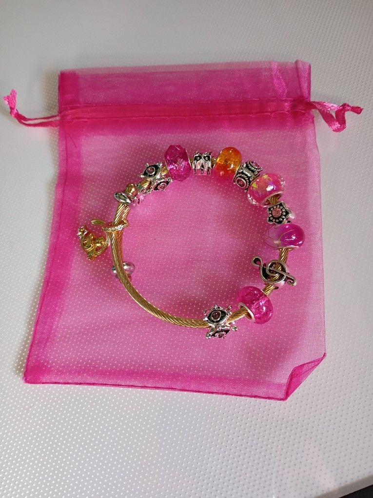 Cable Bracelet With Fusia Pink Charms