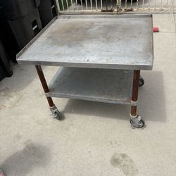 Stainless Rolling Table. 