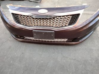 2013-2015 kia optima complete front bumper with Grill and emblem and fog lights with accessories and inner fillers with accessories OEM.