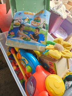 Baby toys bin of random