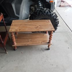 Vintage Shelves And It Has Wheels At The Bottom
