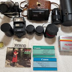 Vintage Camera Equipment With Leather Carrier